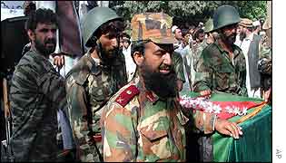 Afghan soldiers escort Qadir's coffin