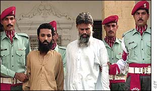 Suspects Mohammad Hanif, left,  and Mohammad Imran Bhai at news conference