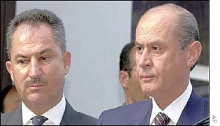 Resigned Deputy PM Husametin Ozkan and MHP head Devlet Bahceli