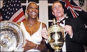 2002 champions Serena Williams and Leyton Hewitt pose with their trophies at the Champions' ball