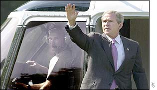 President Bush boards a helicopter at the White House