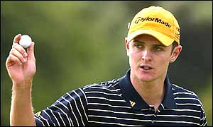 Justin Rose celebrates a birdie  