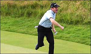 Gary Evans of England celebrates his par putt on the 17th