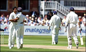 India's  Zaheer Khan celebrates taking the wicket of England opener Michael Vaughan
