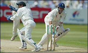 Alec Stewart is stumped by India wicketkeeper  Ajay Ratra