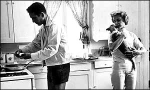 Paul Newman and Joanne Woodward at home, 1958