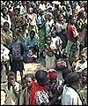 Angolans gather for food