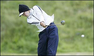 A bogey on the 18th cost Candie Kung the outright lead  