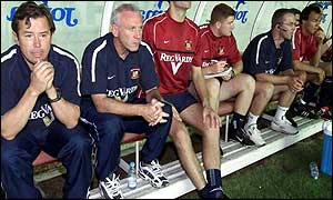 Peter Reid watches his side go down to KAA Gent