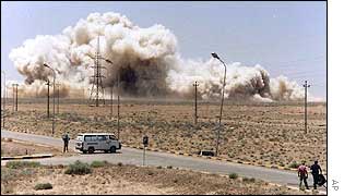 UN inspectors destroy an Iraqi  building