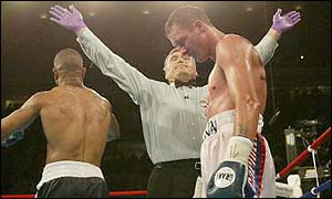 Referee Jay Nady ends the bout halfway through round  six 