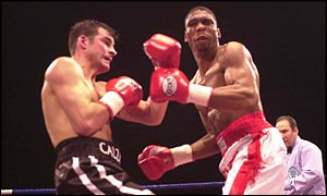 Joe Calzaghe (left) on his way to defeating Charles Brewer
