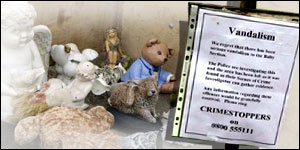 Police posted a notice about the vandalism at the cemetery