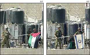 Israelis pulling down the Palestinian flag and raising their own atop Arafat's HQ