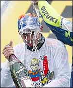Rossi is drenched with champagne