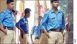 Policemen guard a Hindu temple in Dhaka