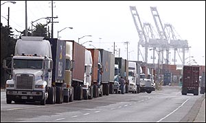 Trucks line Maritime Boulevard in Oakland docks , California 