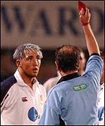 Swansea winger Gavin Henson is sent off by referee David McHugh
