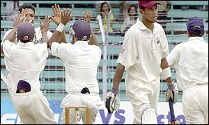 Ramnaresh Sarwan is dismissed by Anil Kumble