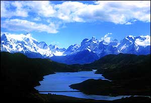 Snowy mountains beyond lake   M Infante/UNEP/Topham