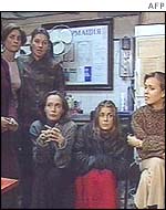 Women hostages on television