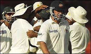 Pakistan celebrate the wicket of Mark Waugh