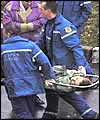 Hostage being taken to ambulance