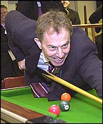 Tony Blair playing pool at the Royal British Legion