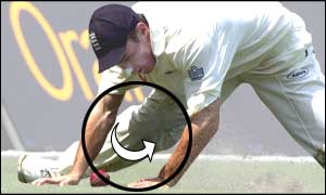 Simon Jones attempts to prevent Ricky Ponting's drive going for four runs