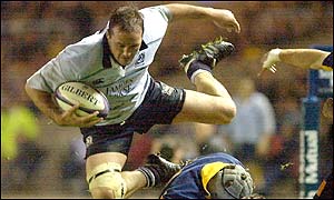 Scotland's Martin Leslie takes a leap as Romania are beaten at Murrayfield