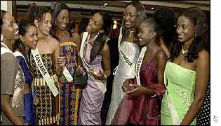 Miss Nigeria Chinenye Ivy Ochuba (centre) with other contestants at a Gala in London  on November 10 