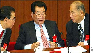 Parliament Chairman Li Peng (L) chats with top adviser Li Ruihuan (C) and politburo member Wei  Jianxing