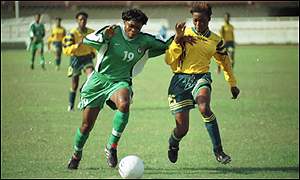 Mercy Akide (left) in action for Nigeria