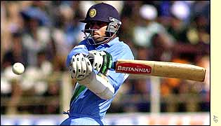 Rahul Dravid smashes a boundary during his 58