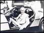 John de Lorean in the DMC-12 car produced by his company