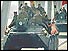 Soviet troops on a tank leaving Afghanistan in 1989