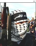 Palestinian militant from the al-Aqsa Martyrs Brigade at a funeral in Gaza