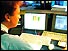 IX trader looks at computer