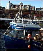 Trawler at quayside   PA
