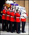 The Queen Mother's coffin is carried out of Westminster Hall