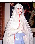 Italian statue of bleeding virgin   AP