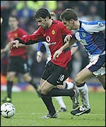 Ruud van Nistelrooy is closely watched by Blackburn defender Craig Short