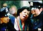 Injured woman is helped by police