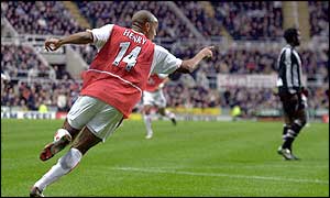 Henry wheels away after his 18th Premiership goal of the season 