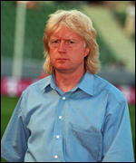 The not exactly folliclly-challenged Winfried Schafer