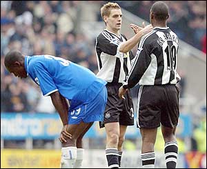 Jonathan Woodgate has a good debut for Newcastle and celebrates with Titus Bramble after a hard fought win