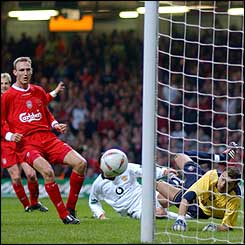 Ruud van Nistelrooy sees a shot flash just past the post after 25 minutes