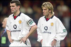 United captain Roy Keane and Beckham look glum