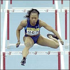 Gail Devers wins her  place in the final of the women's 60m hurdles in style 