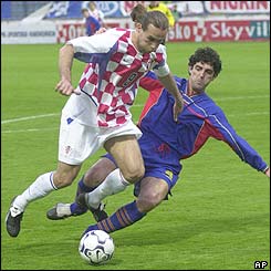 Croatia's Dado Prsa is challenged by Andorra's Roberto Jonas Alonso  